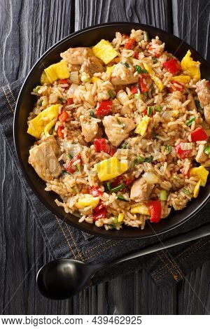 Peruvian Fried Rice With Meat And Eggs Arroz Chaufa Close Up In The Bowl On The Table. Vertical Top 