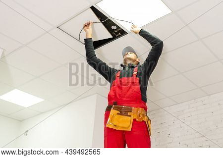Builder Replacing Ceiling Panel, Working, Ceiling Armstrong