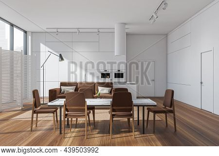 White And Brown Dining Room Interior With Sofa And Kitchen On Background. Minimalist Concept. Modern