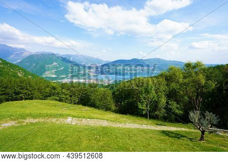 View From The Abbey Of San Pietro Al Monte With Lake Annone, Lombardy, Italy