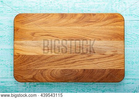Multifunctional Wooden Chopping Board For Cutting Bread, Pizza Or Steak On Wood Background. Soace Fo
