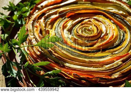 Vegetable Pie Mexican Sun. Round Open Pie Made From Zucchini, Eggplant And Carrots. Close-up Top Vie