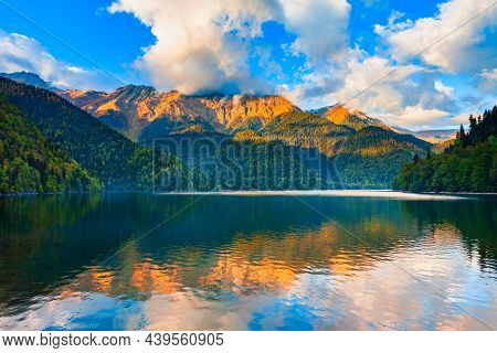 Lake Ritsa Panoramic View At Sunset. Lake Ritsa Is A Lake In The Caucasus Mountains In Abkhazia Regi