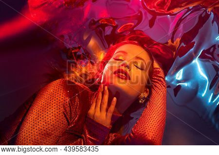 Portrait Of A Young Beautiful Woman On A Shimmering Background, Iridescent Colored Light, Futuristic