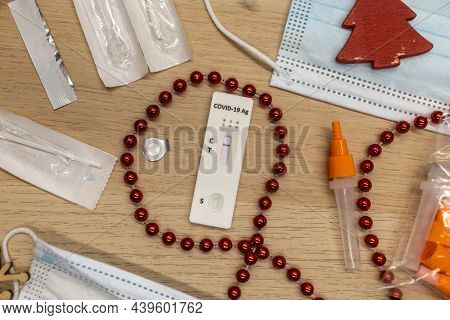 Christmas Decoration And Covid Test With Mask On Table