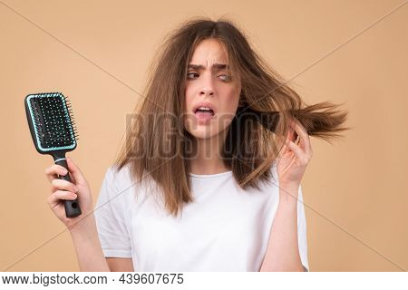 Hair Loss Woman With A Comb And Problem Hair. Hairloss And Bald Problems Concept.