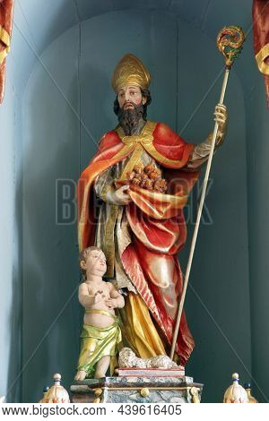 BRCKOVLJANI, CROATIA - JUNE 15, 2013: Saint Brice, Main altar in the Church of the Saint Brice of Tours in Brckovljani, Croatia