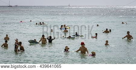 Honolulu, Hawaii - Nov 6, 2021-young Boys Play On Their Boogey Boards In The Surf.