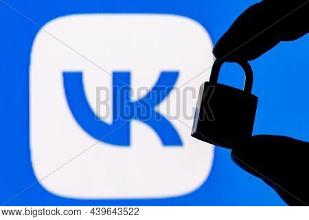 Kazan, Russia - Nov 13, 2021: Fingers Hold A Closed Security Lock On The Background Of The Vkontakte