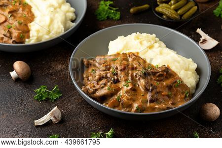 Beef Stroganoff With Mushrooms And Mashed Potatoes.
