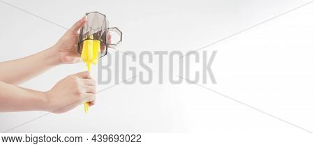 Clean And Wash Dish Concept. Man Hand Washing Drink Glass On White Background.