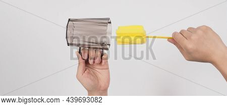 Clean And Wash Dish Concept. Man Hand Washing Drink Glass On White Background.