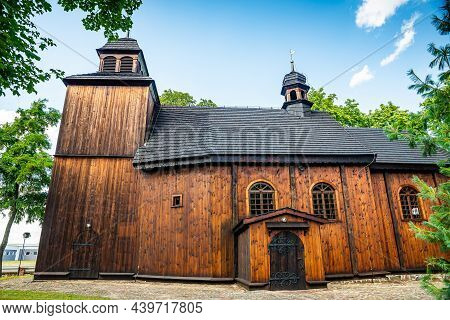 Lubowo, Poland - August 09, 2021. Old Wooden St. Mikolaj Church - Kosciol Pw. Sw. Mikolaja