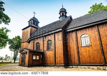 Lubowo, Poland - August 09, 2021. Old Wooden St. Mikolaj Church - Kosciol Pw. Sw. Mikolaja