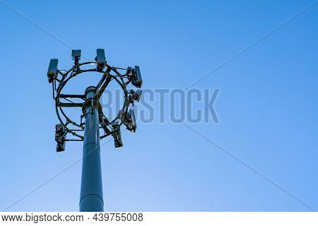 Mobile Telecome Cell Tower On Blue Sky Background