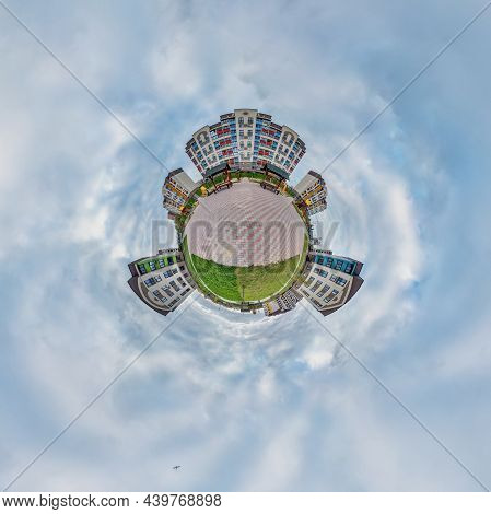 Tiny Planet In Blue Sky With Clouds In Modern Multi-storey Multi-apartment Residential Complex Of Ur