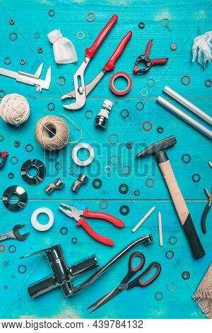 Plumbing Toolset Flat Lay Top View On Blue Wooden Background