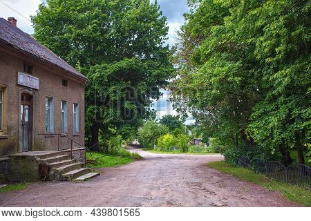 Krasnolesye, Russia - June 12, 2016: View Of The Rural Street And One Of The Old Historical German B