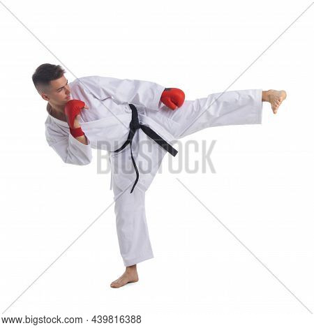 Black Belt Taekwondo Karate Athlete Man Show Traditional Fighting Pose High Leg Kick In Sport Unifor