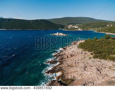 View From The Lustica Peninsula To The Island Of Otocic Gospa. Montenegro