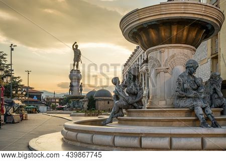 Skopje, Northern Macedonia - July 19, 2021: Warrior monument and other sculptures in Skopje city center in summer. Street scene from Skopje, capital of North Macedonia
