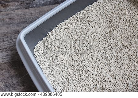 Cat Litterbox With Natural Flushable Biodegradable Tofu Litter. Eco-friendly Product For Indoor Pets