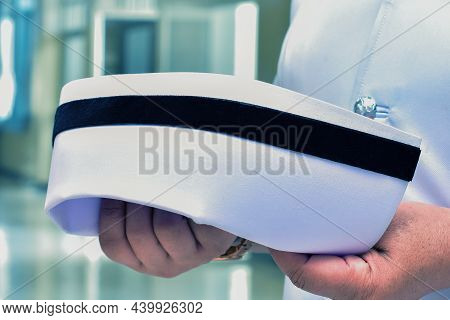 Nurses Are Holding A Nursing Cap. Nursing Uniform Concept
