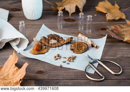Dried Chopped Amanita On Parchment And Scissors On A Wooden Table. Microdosing And Alternative Medic