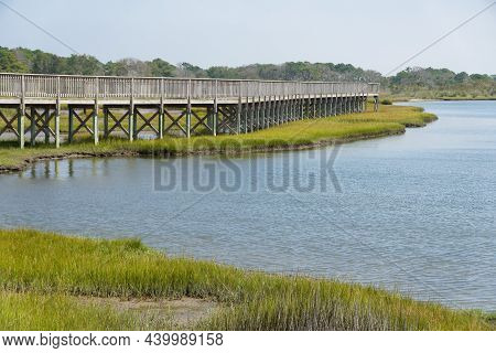 The Wooden Boardwalk By The Bay Near Assateague Island, Maryland, U.s