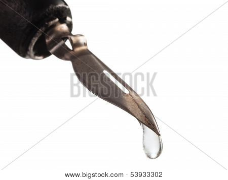Water Drop Dripping From The Tip Pen