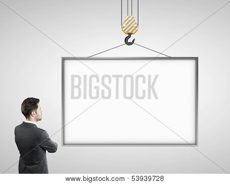 Man Looking At Blank Billboard