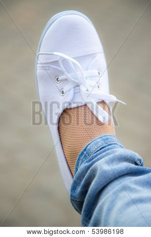 Foot in sneaker