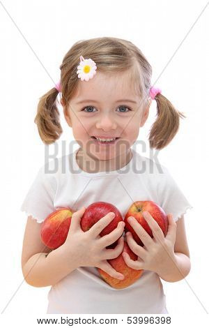 Little girl with red apples