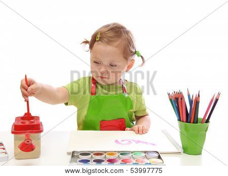 Little girl painting isolated on white background