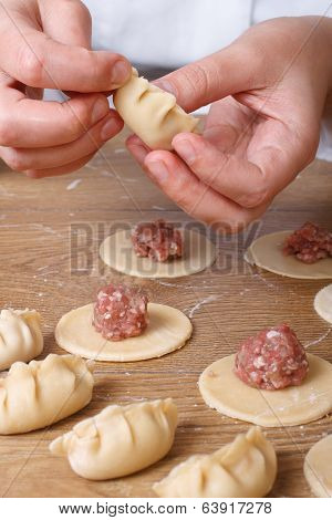 Cook Hands Preparing Asian Gyoza  Dumplings