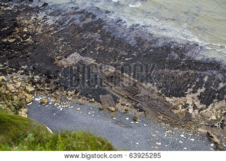 Trace of the old ship on the sea bottom during the tide off  English south coast line, Kent