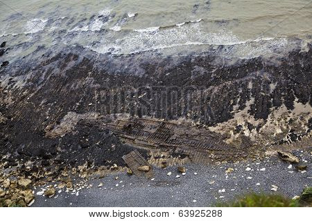 Trace of the old ship on the sea bottom during the tide off  English south coast line, Kent