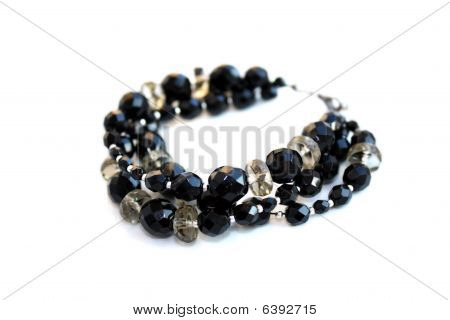 Pulseira artesanal com contas de pretas e cinza