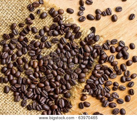 Fresh Coffee Beans On Wood Background