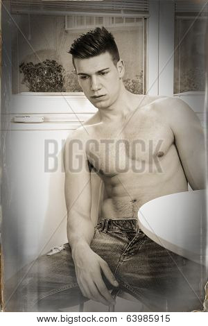 Sad Pensive Lonely Guy In Jeans With Naked Chest Sitting