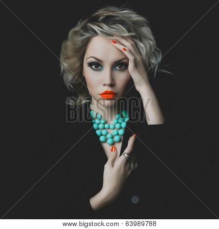 Beautiful Blonde With Bright Makeup And Jewelry