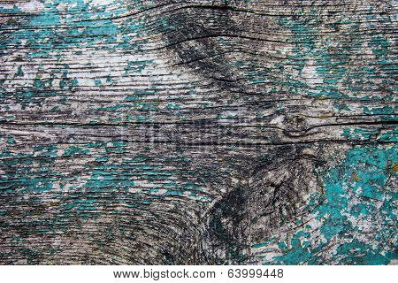 Old Wooden Plank With The Remains Of Cracked Blue Paint