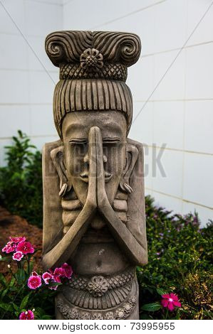 Ceramic dolls in the garden