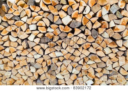 Pile of firewood as tree trunks