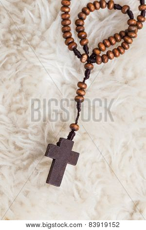 Christian Cross Necklace On Sheep Wool, Jesus Religion Concept As Good Friday Or Easter Festival