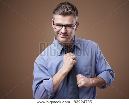Confident Businessman Getting Ready