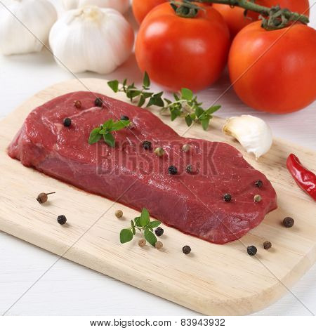 Raw Beef Meat Steak On Cutting Board