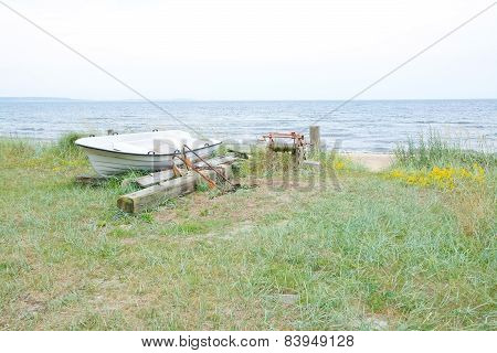 Small boat and gear on the sandy beach