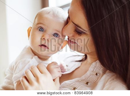 Little baby girl with her mother