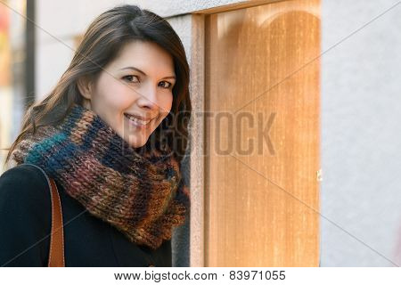 Attractive Woman Looking Into Store Window